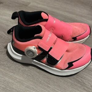 New Balance Coral and Black Sneakers